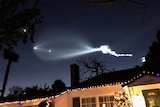 The SpaceX Falcon 9 launch in the night sky.