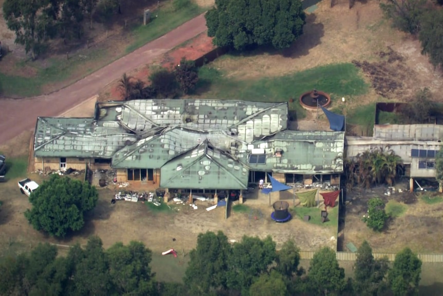 An aerial photo of a home destroyed by fire