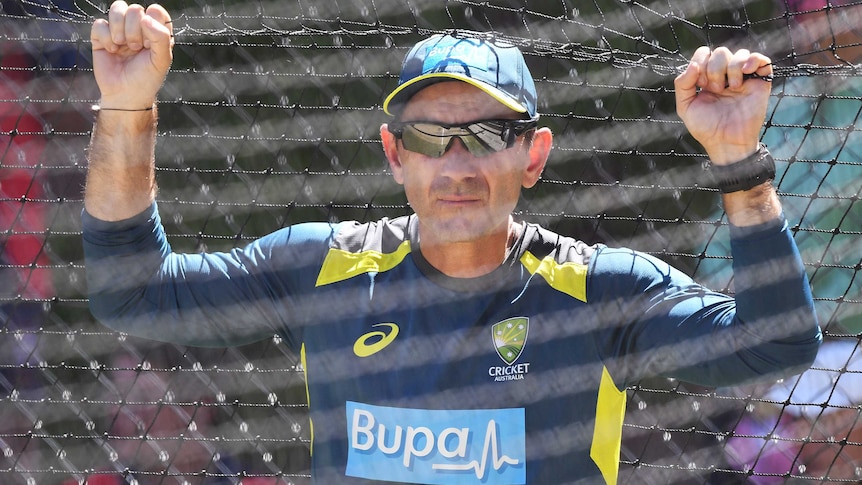 Justin Langer watches Australia training