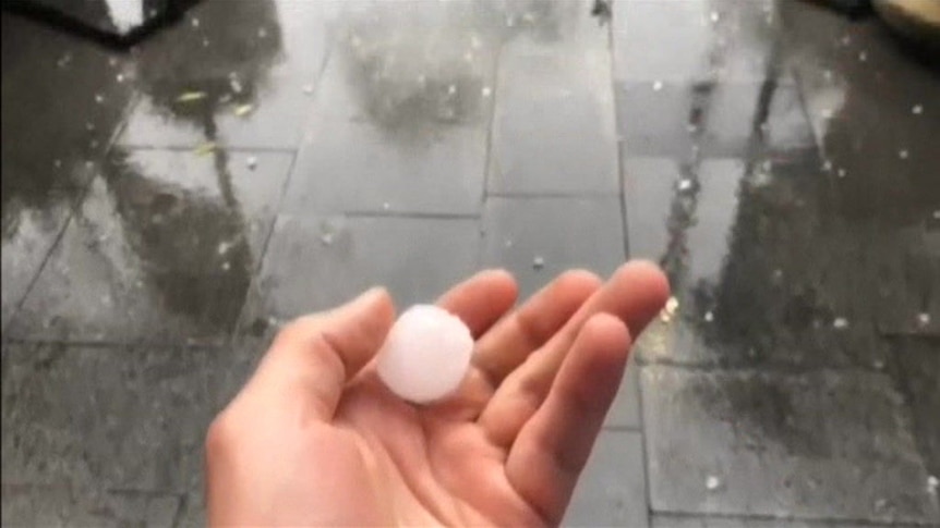 Reports of hail stones as large as tennis balls cause mayhem