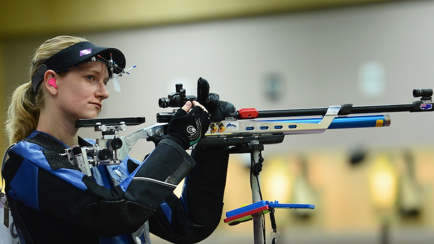 Close but not close enough ... Robyn Van Nus competes in the women's 10-metre air rifle qualification round