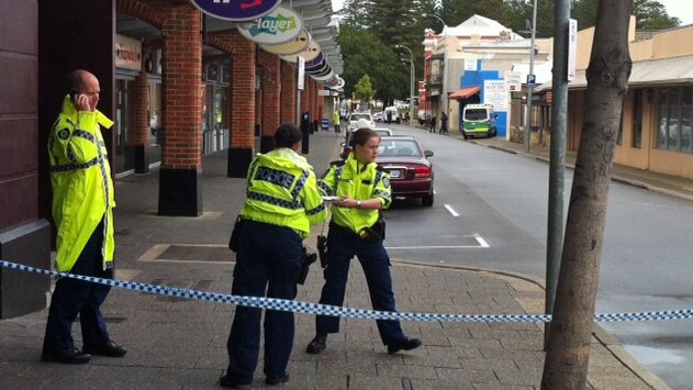 Police rope off street in Fremantle near where body found