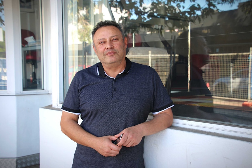 Real Estate business owner Payam Golestani stands on Beaufort Street.