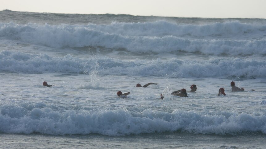 The swim test in big, messy surf