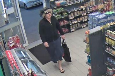 Cross dressing thief robs Melbourne service station