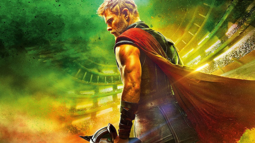 Thor holds a hammer as a presumptive apocalypse rages around him