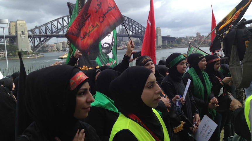 Muslims taking part in the Ashura Procession at the Botanical Gardens on Sydney Harbour.