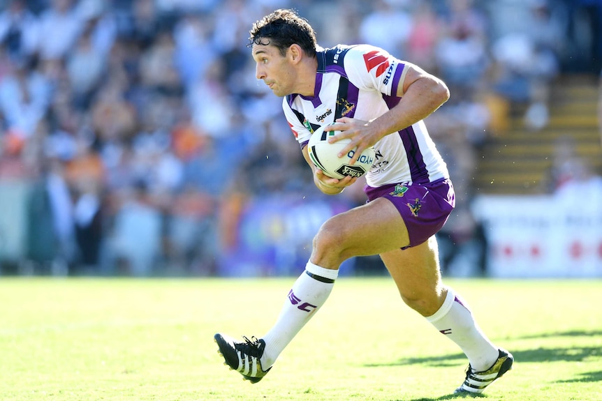 Billy Slater runs the ball for the Storm