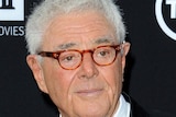 A photo of Richard Donner in glasses