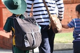 Parent walks young student to Tasmanian school