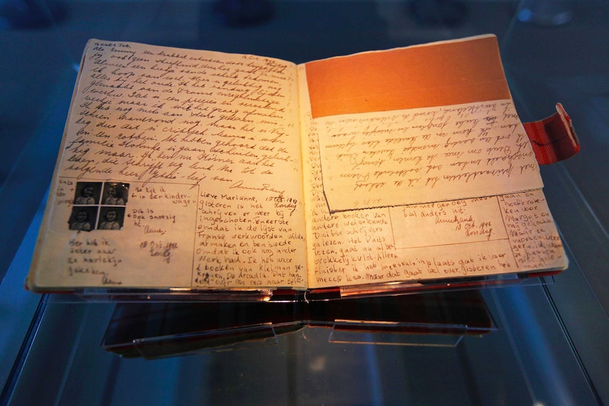 The diary of Anne Frank sits on display in the Anne Frank House in Amsterdam.
