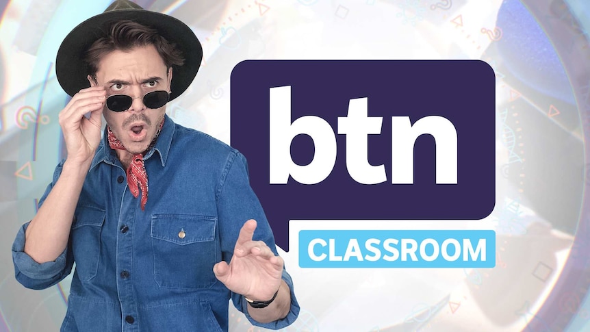 Jack dressed up as Alan Grant from Jurassic Park in front of the BTN logo
