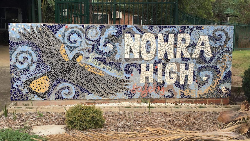 A mosaic sign outside Nowra High School.