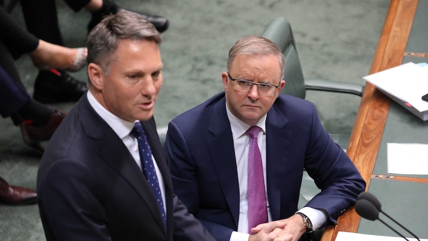 Richard Marles stands at the despatch box in the House of Representatives, as Anthony Albanese looks on