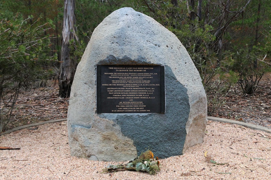 A granite memorial cairn marks the exact site of the crash.