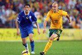 Mark Bresciano runs with the ball during the Socceroos' World Cup qualifier against Uzbekistan