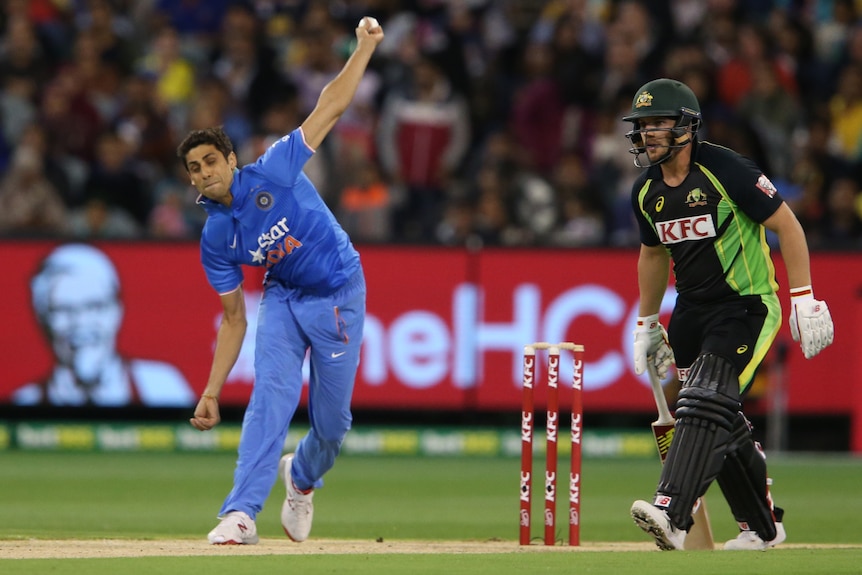 India's Ashish Nehra bowls in T20 international against Australia