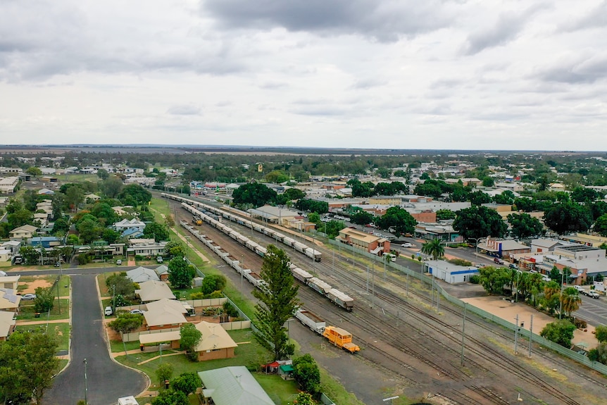 An aerial photo of Emerald railway station overlooking the town centre behind, Emerald, November 2021.