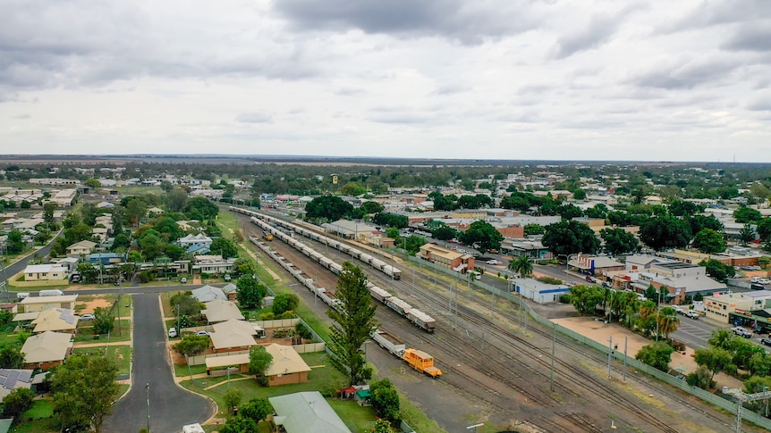 An aerial photo of Emerald railway station overlooking the town centre behind, Emerald, November 2021.