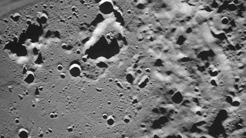 A picture taken from the camera of the lunar landing spacecraft shows Zeeman crater located on the far side of the moon.