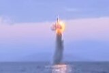Still showing North Korean submarine missile launch