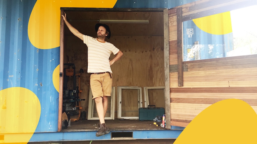 Reporter Nick Kilvert standing out the front of his backyard shed, in a story about long-term work-from-home space tips.