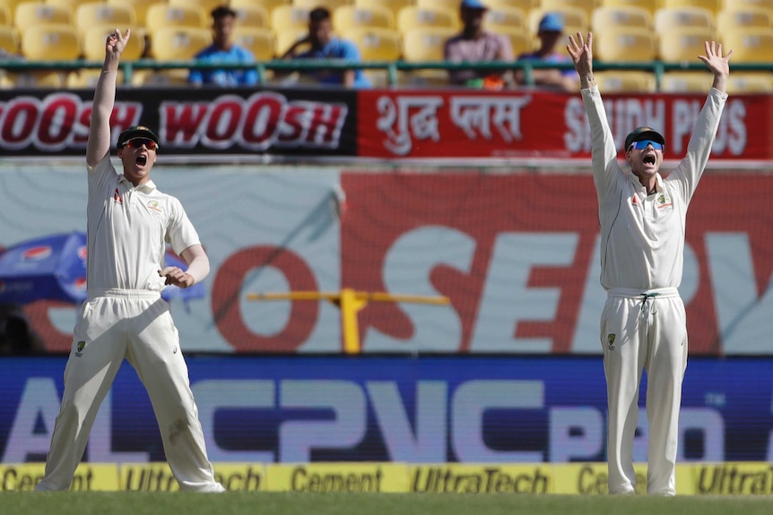 Matt Renshaw and Steve Smith appeal for an India wicket