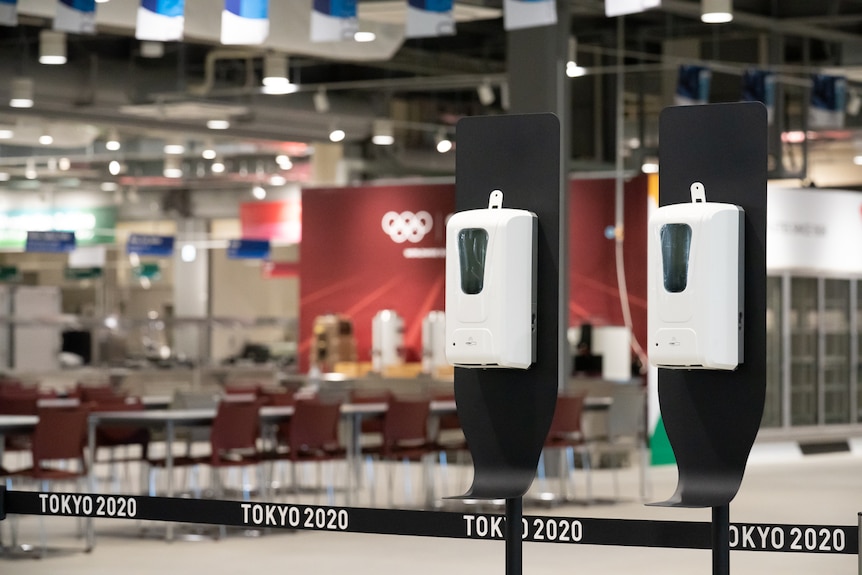 The athletes main dining hall with plenty of hand sanitizer on standby.