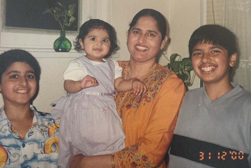 Harpreet Dhillon as a little girl with her mum and two older brothers