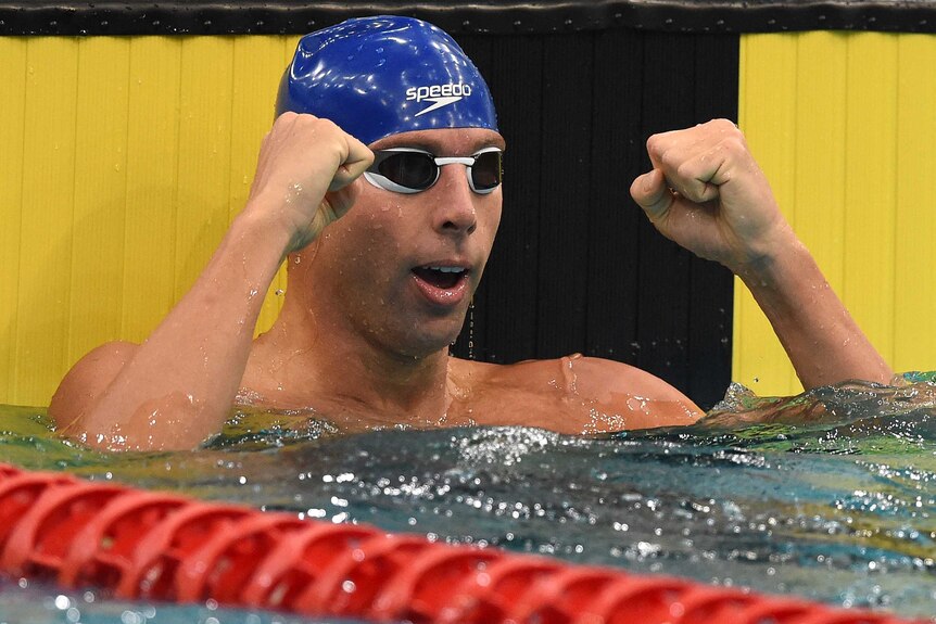 Grant Hackett celebrates after the 200m freestyle