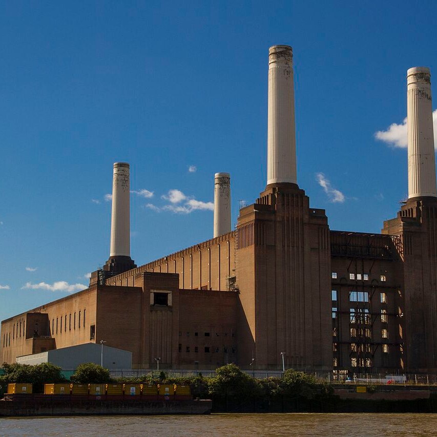 A view of the defunct coal-burning Battersea Power Station from the river Thames in London