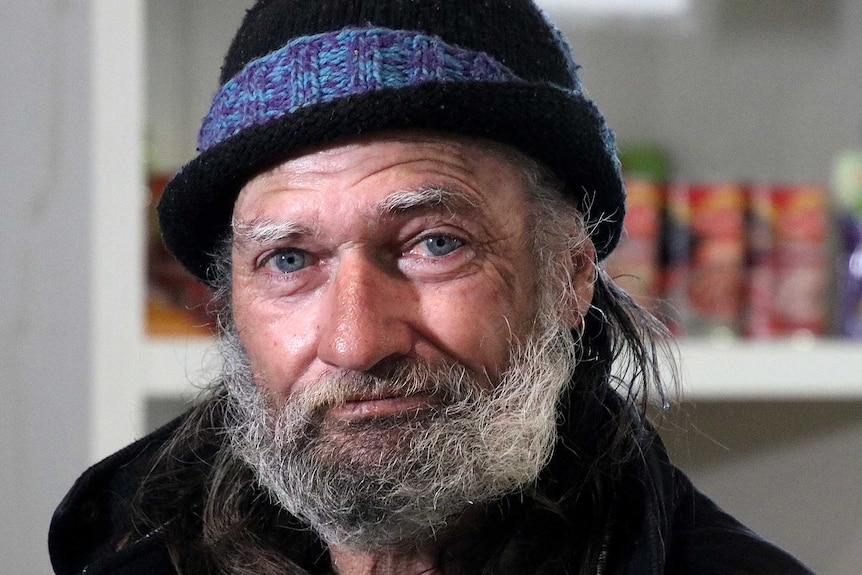 A head shot of Steve Bond wearing a beanie.