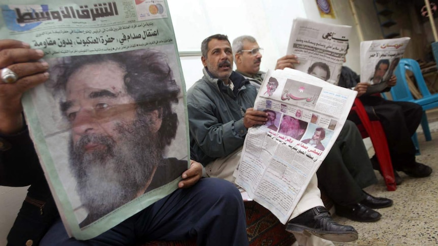 Newspaper reports about the capture of Saddam Hussein