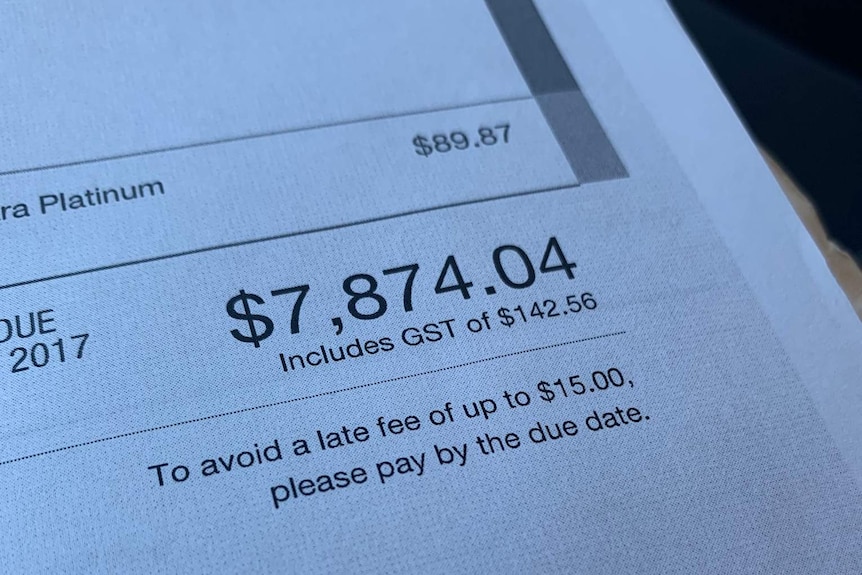 A phone bill worth $7,874.04.