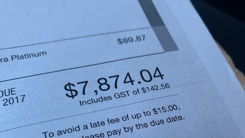 A phone bill worth $7,874.04.