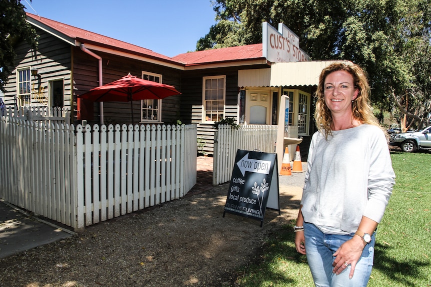 Claire Morgan standing in front of her gift shop.