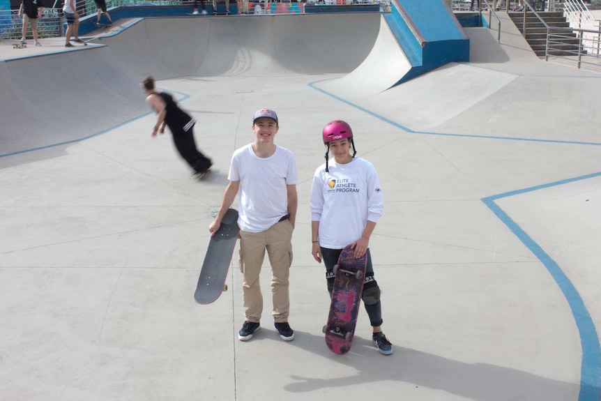 Amar Hadid and Mikey Mendoza standing in the centre of the skate ramp at Bondi