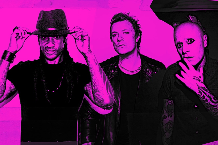 Members of The Prodigy, with pink tone over picture