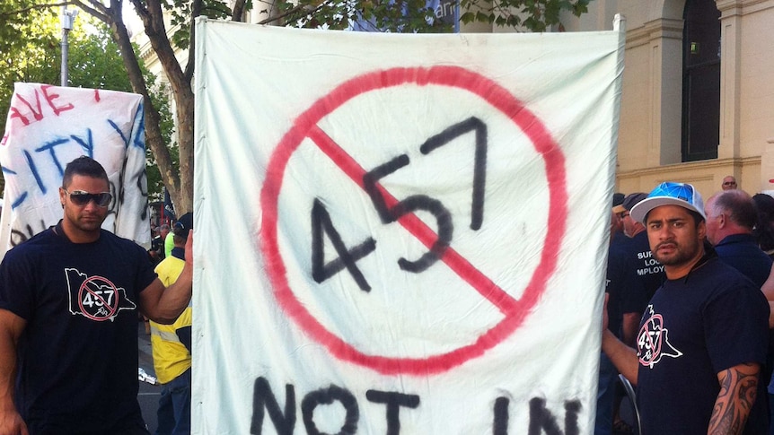 A sheet painted with "457" with a strike through it