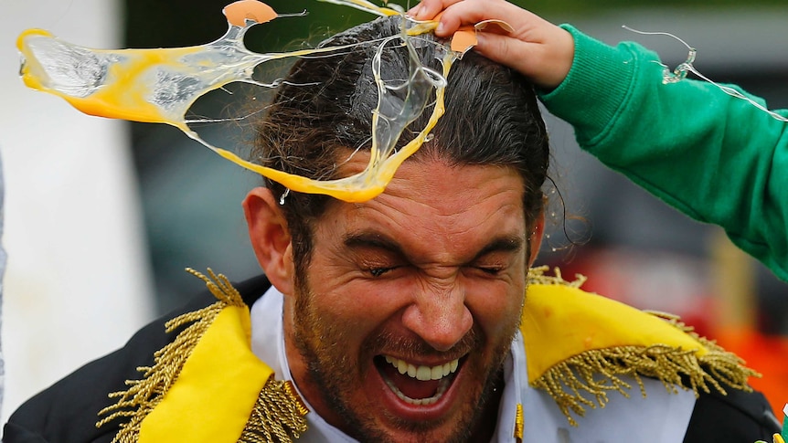 Man has egg smashed on his head during world egg throwing championships
