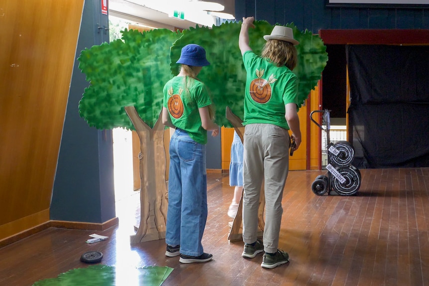 The Faggotter family assembling prop trees, Longreach November 2023.