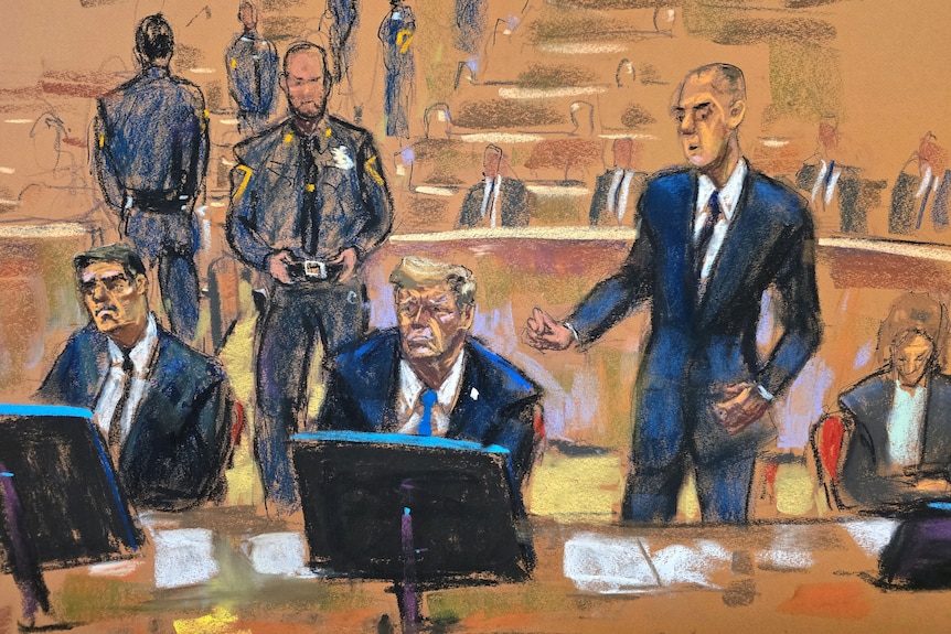 A court sketch of Donald Trump sitting in court flanked by his lawyers