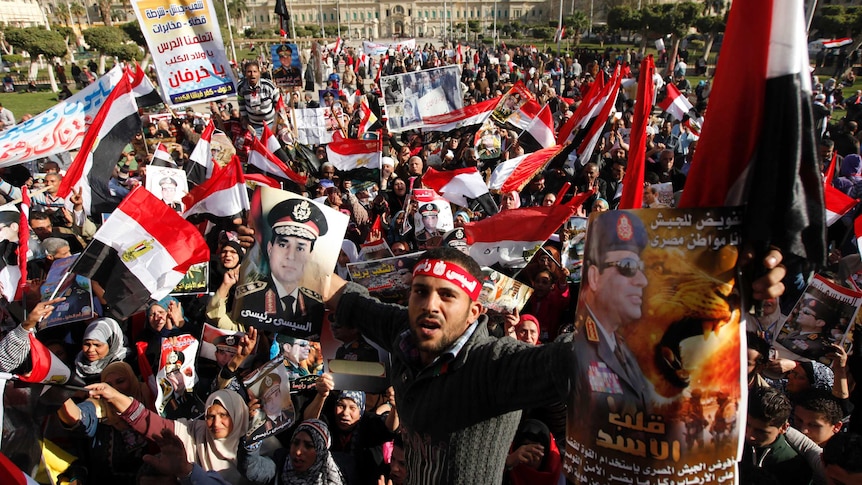 Egyptians protest in Cairo after a wave of deadly bomb attacks