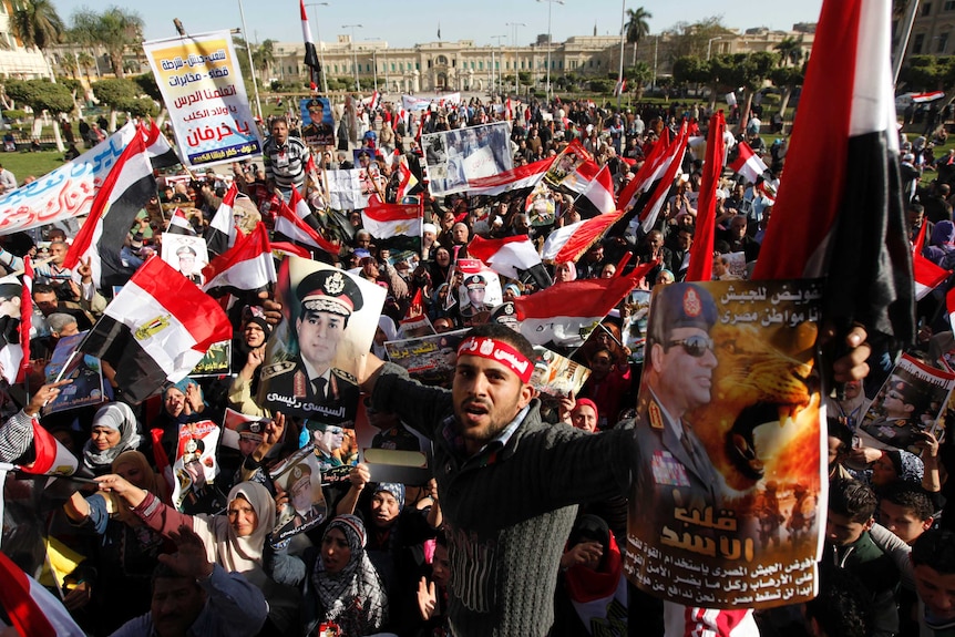 Egyptians protest in Cairo after a wave of deadly bomb attacks