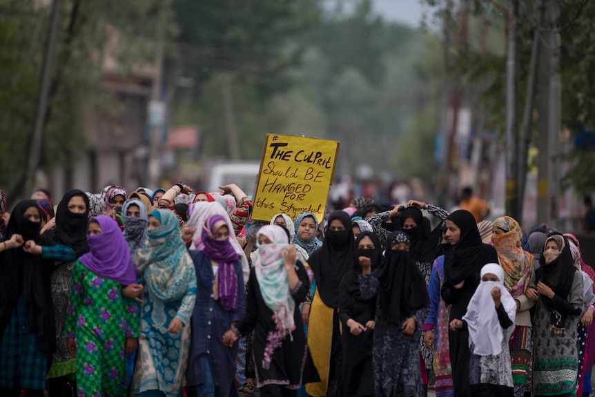 Kashmiri women participate in a protest against the alleged rape of a three year old girl from north Kashmir at Mirgund.