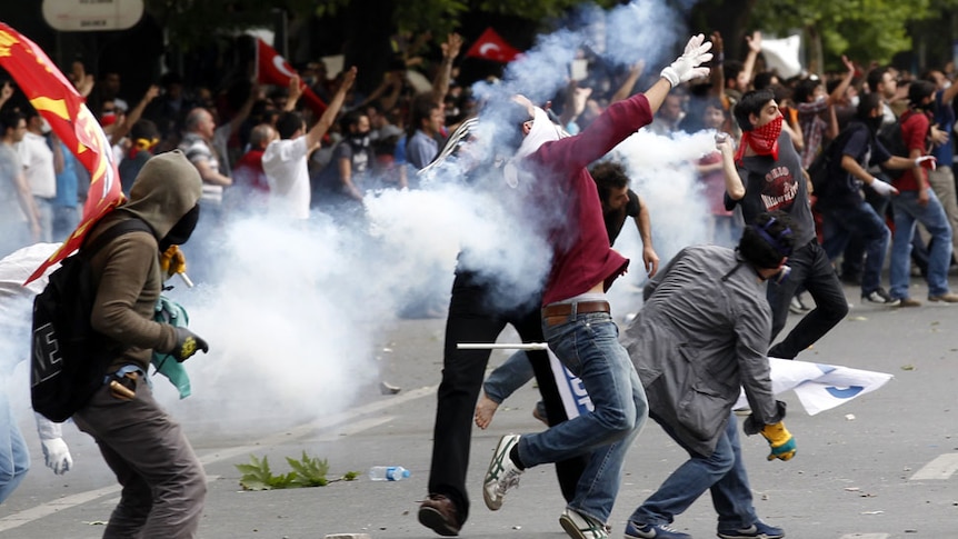 Demonstrators clash with riot police during a protest against Turkish prime minister Tayyip Erdogan in Ankara.