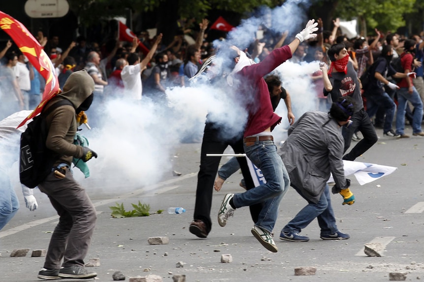 Demonstrators clash with riot police during a protest against Turkish prime minister Tayyip Erdogan in Ankara.