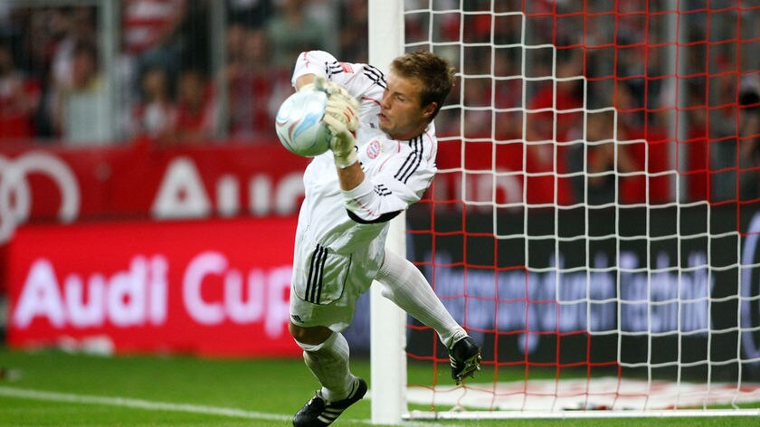 Bayern keeper Rensing makes a save
