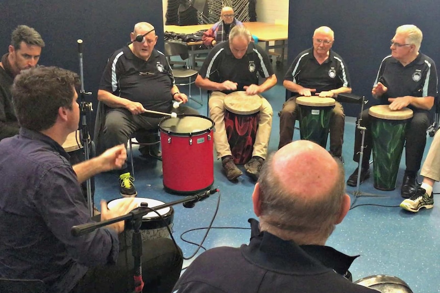 Veterans use group drumming to combat PTSD