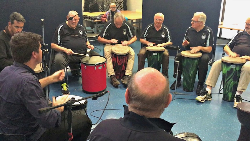 Veterans use group drumming to combat PTSD